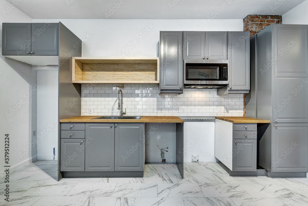 Fototapeta premium Real estate photography - Empty renovated apartment in Montreal. Old French style 6x plex in old part of Montreal 