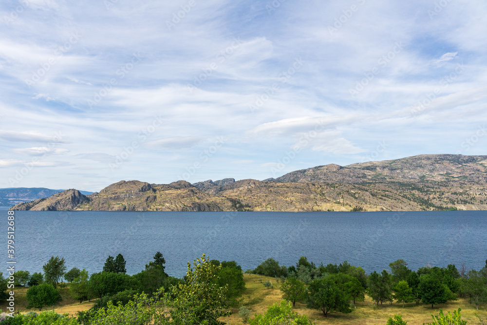Okanagan lake view at summer time with blue sky british columbia canada Okanagan lake view at summer time with blue sky british columbia canada