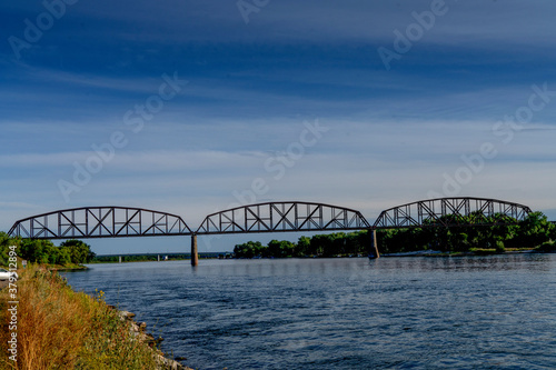 BNSF rail bridge across Missouri River near Bismarck North Dakota photo