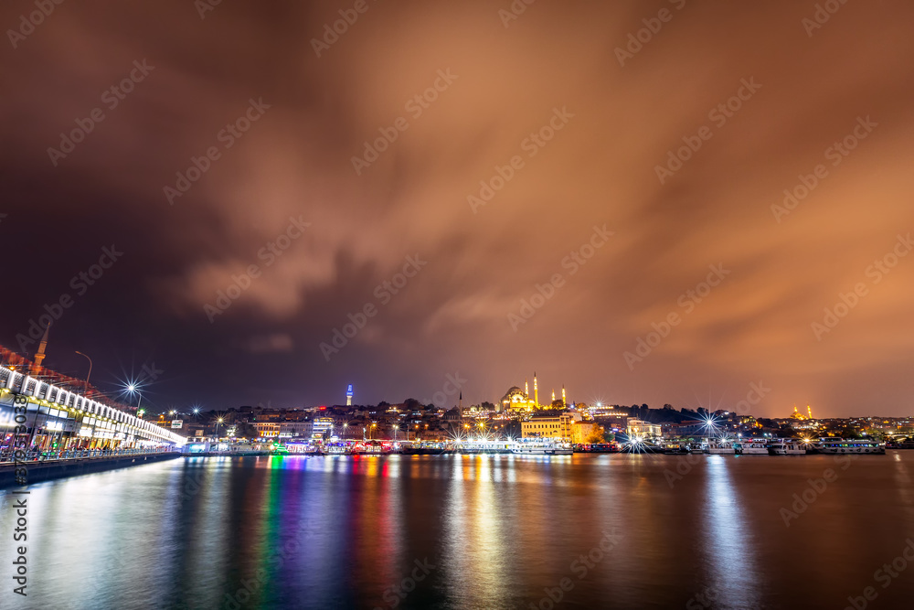 Night view of Bosphorus (Turkish: Istanbul Bogazi). The Bosporus or Bosphorus also known as the Strait of Istanbul. It is a narrow, natural strait and an internationally significant waterway located.