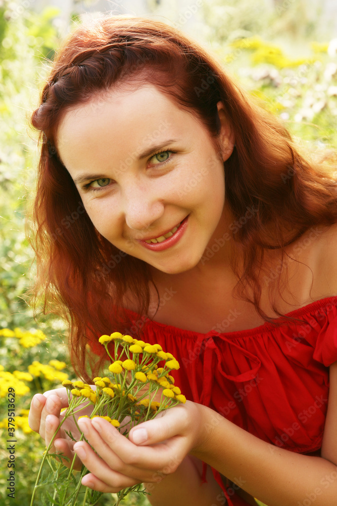 young woman and wild flowers. young woman and wild flowers.