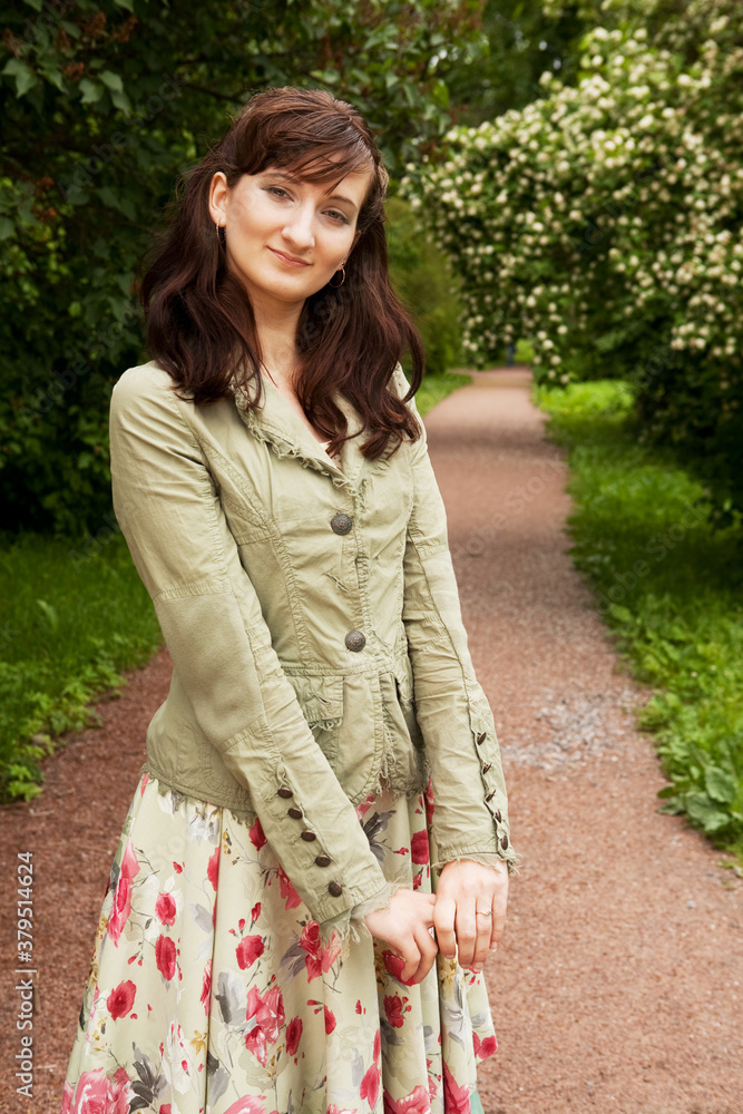 Woman relaxing outdoors smiling