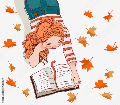 Cute girl reads a book