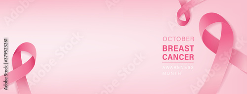 Beautiful breast cancer awareness campaign banner with pink ribbon symbols on gradient pastel light pink background and space for text