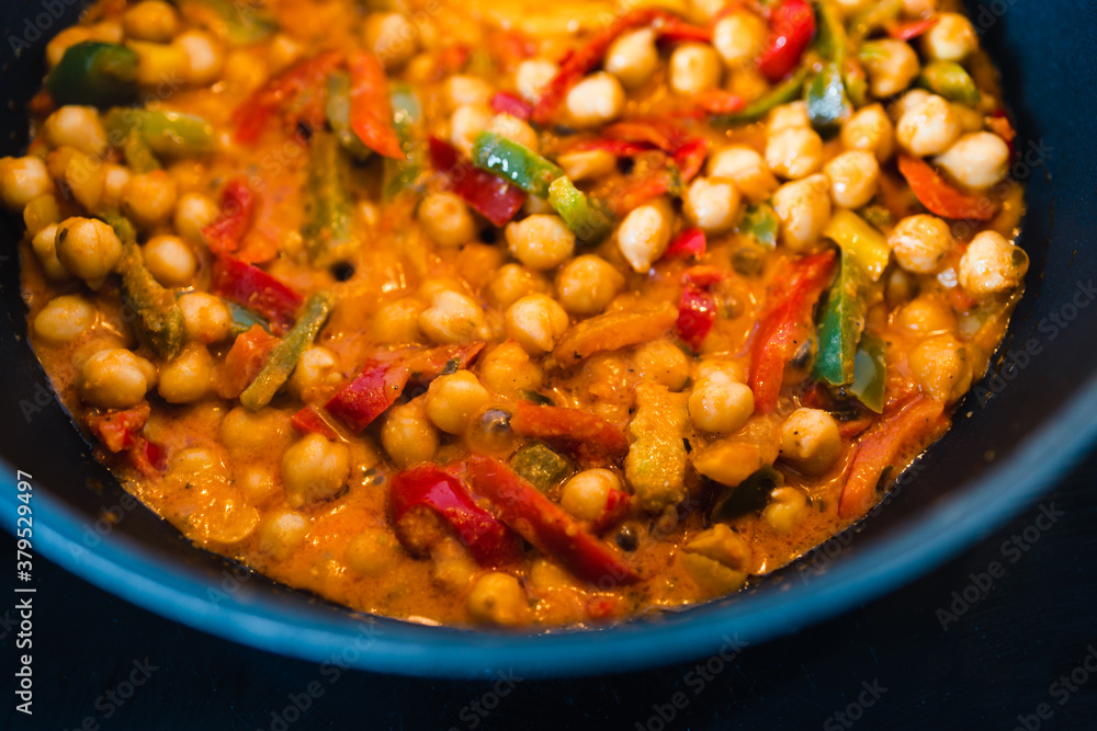 plant-based food, vegan chickpeas red pesto stew with capsicums and spices plant-based food, vegan chickpeas red pesto stew with capsicums and spices