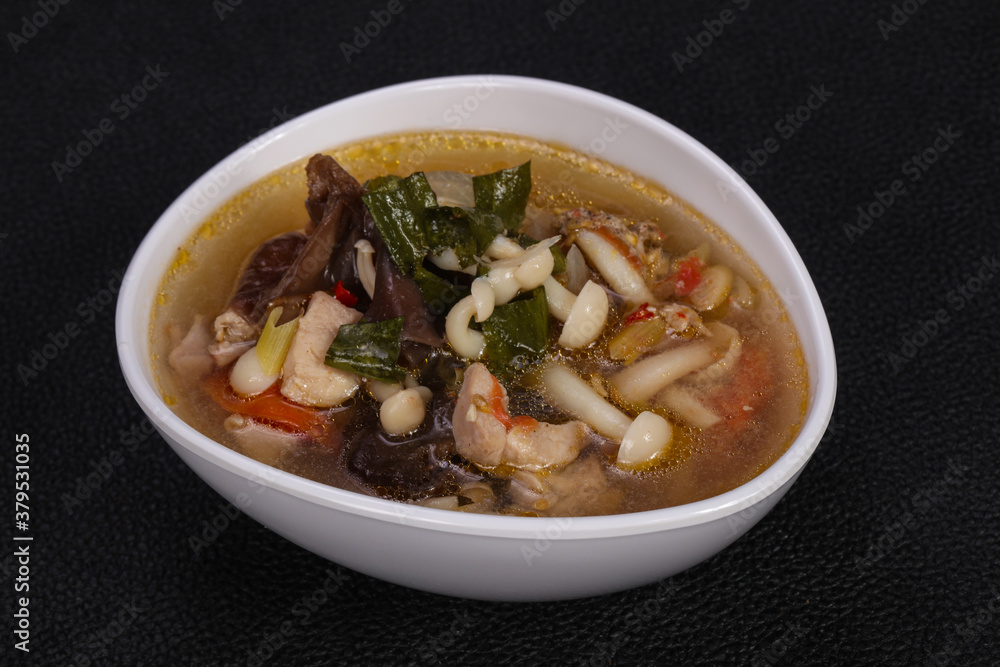 Thai style soup with meat and mushrooms Thai style soup with meat and mushrooms