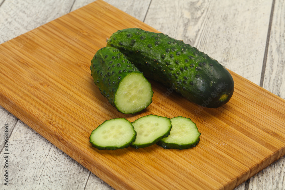 Ripe fresh green two cucumbers Ripe fresh green two cucumbers