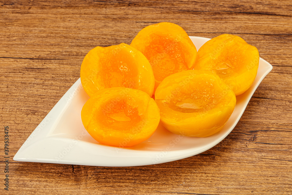 Marinated peaches fruit in the bowl Marinated peaches fruit in the bowl