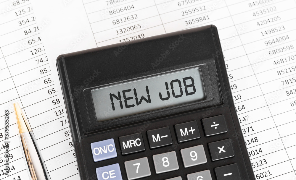 Calculator with the word New job on the display Calculator with the word New job on the display