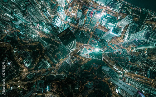 Fotomural Top view aerial photo from flying drone of a developed metropolitan city in Hong Kong with office skyscrapers