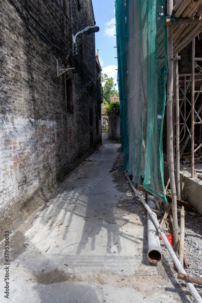 alleyway with construction in Chinese village