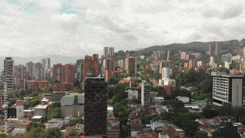 Aerial View of Modern Upscale Residential Neighborhood of Medellin City Colombia Buildings Under Cloudy Sky, Drone Shot photo