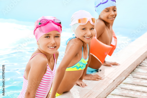 Cute little children in swi...