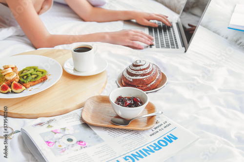 Tasty breakfast and newspap...