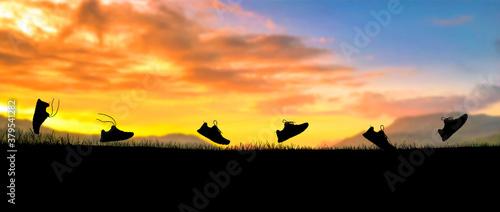 Concept design for Trail running   Silluette running Shoe running along the way at the sunset time.