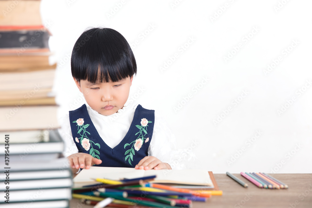 Little girl is studying hard Little girl is studying hard