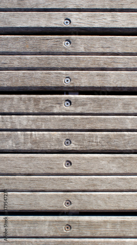 Wallpaper Mural strong berth from wooden boards on metal beams is nailed Torontodigital.ca