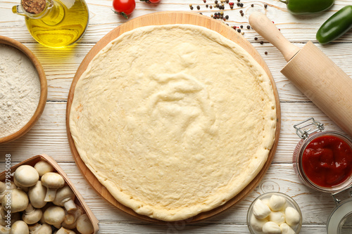 Obraz na płótnie Ingredients for cooking pizza on wooden background