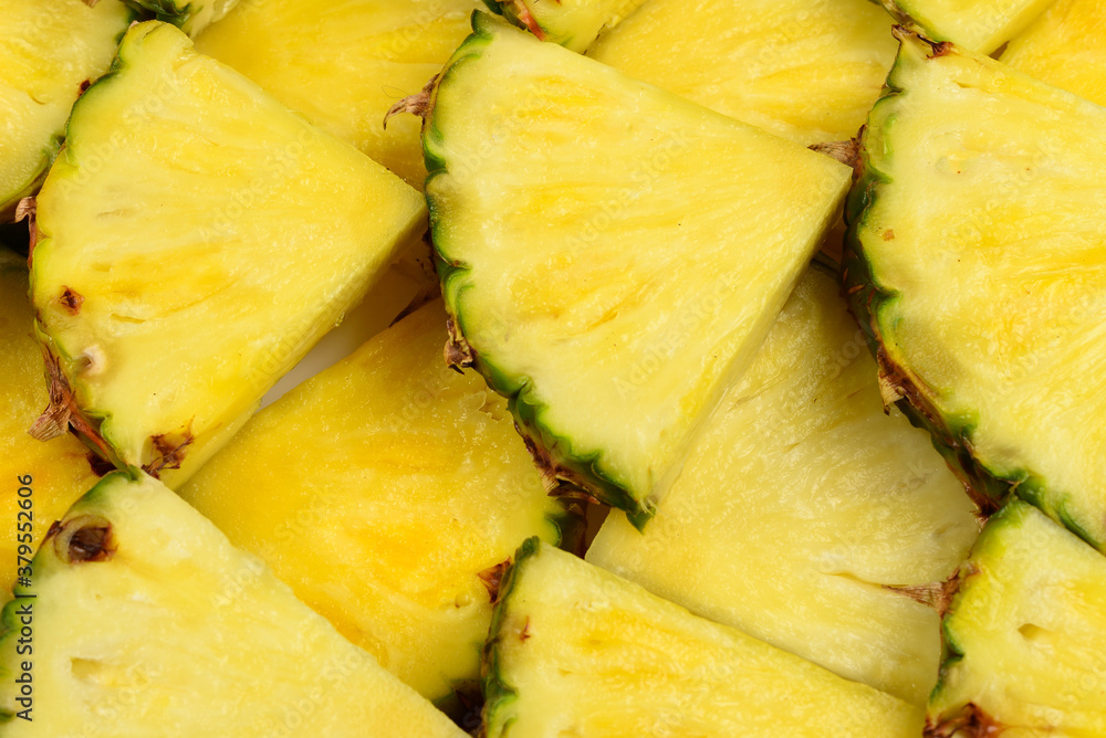 Pineapple juicy yellow slices background. Top view. Pineapple juicy yellow slices background. Top view.
