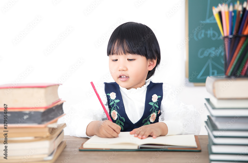 Little chinese girl learning to write Little chinese girl learning to write