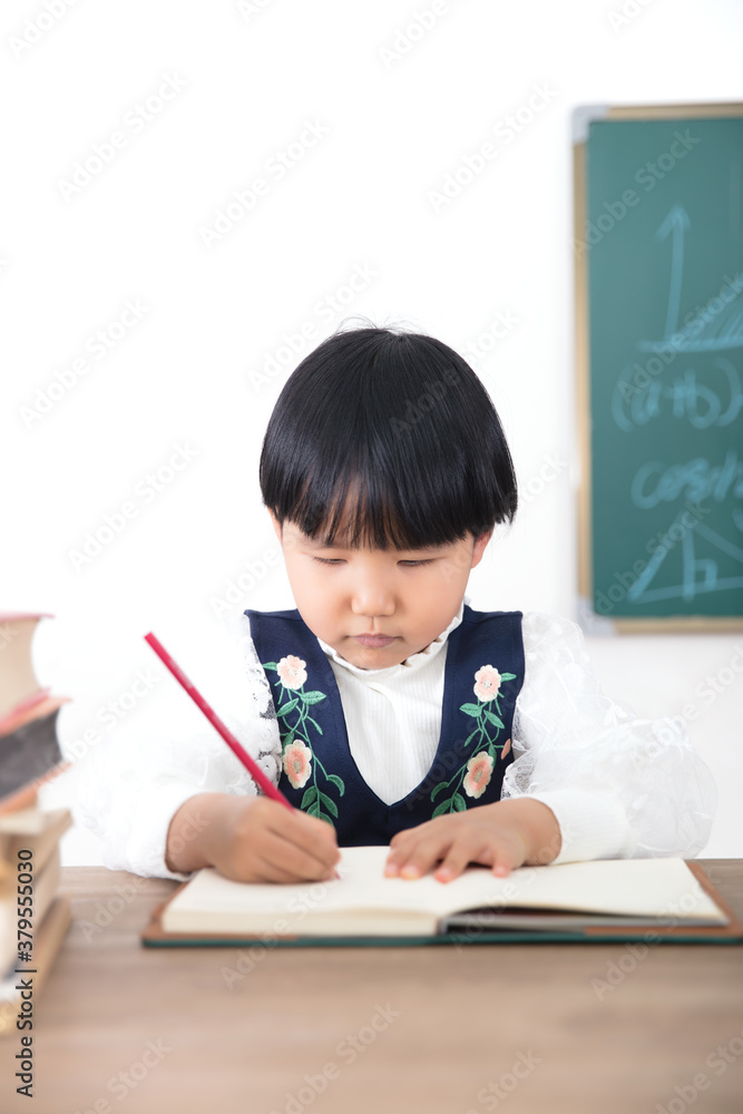 Chinese children is writing seriously Chinese children is writing seriously