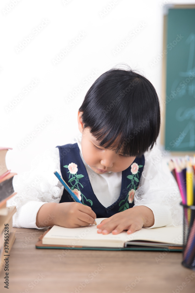 Cute Chinese little girl studying Cute Chinese little girl studying