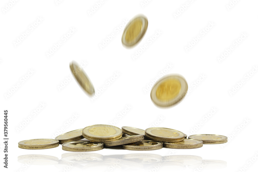 Falling coins (with motion blur) onto a pile of coins Falling coins (with motion blur) onto a pile of coins