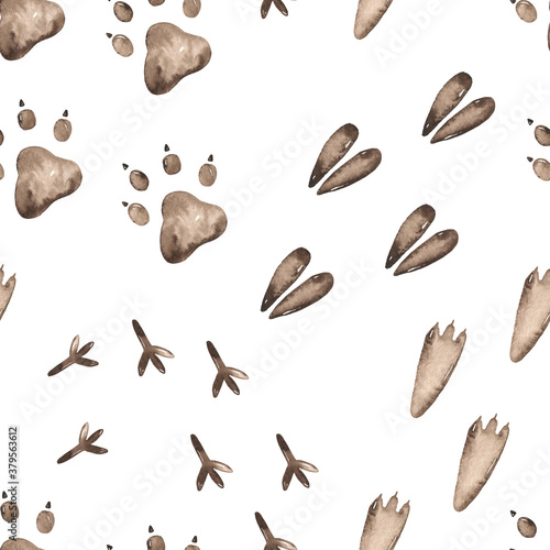 Watercolor seamless pattern with animal footprints on a white background