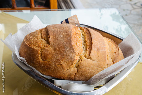 Fresh, tasty and crusty baked bread  in the fish tavern of Cyprus