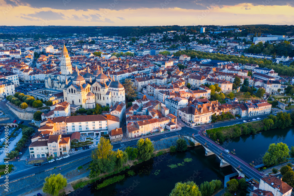 View from drone of houses and ancient Catholic Cathedral of Perigueux town at summer daybreak, France