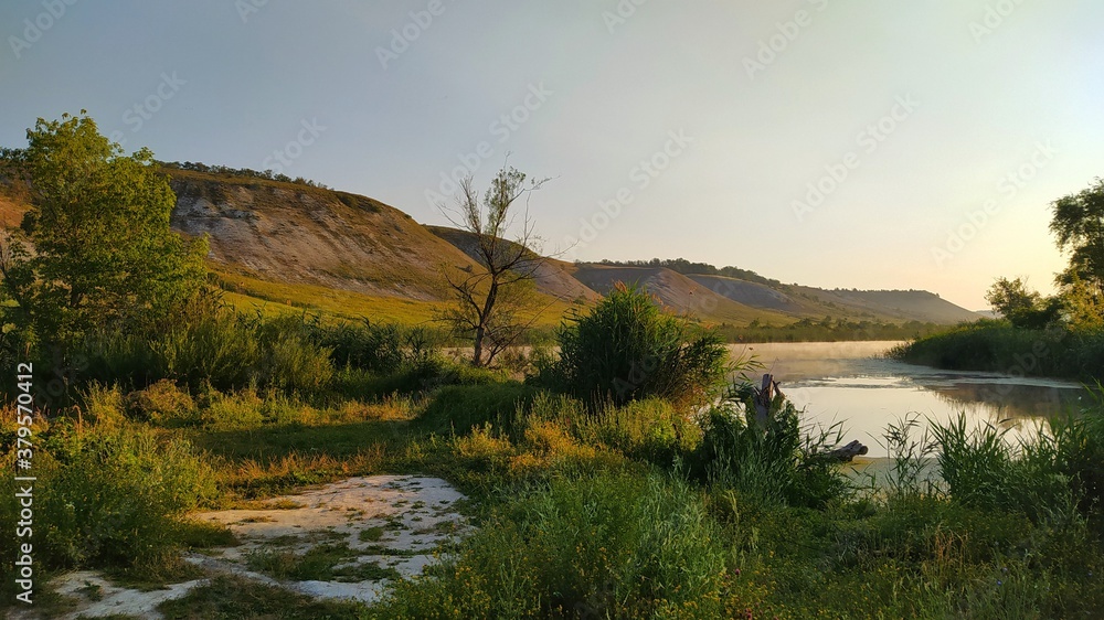Obraz premium sunrise over the river
