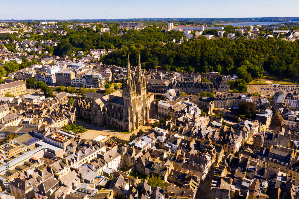 Aerial panoramic view of French commune of Quimper looking out over Gothic building of Cathedral of Saint Corentin, Finistere, Brittany..