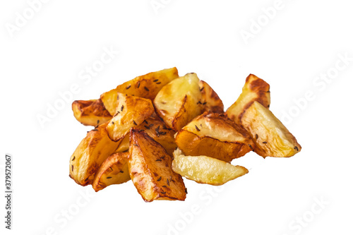 Baked potato wedges with cumin isolated on white