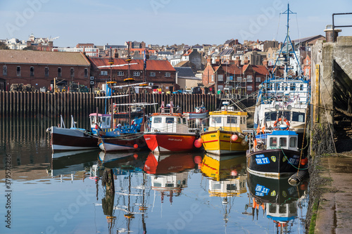 Colourful fishing boats in Scarborough harbour