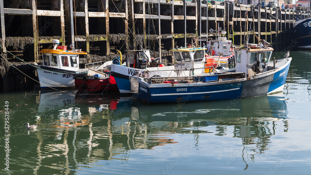 Cluster of fishing boats in Scarborough harbour