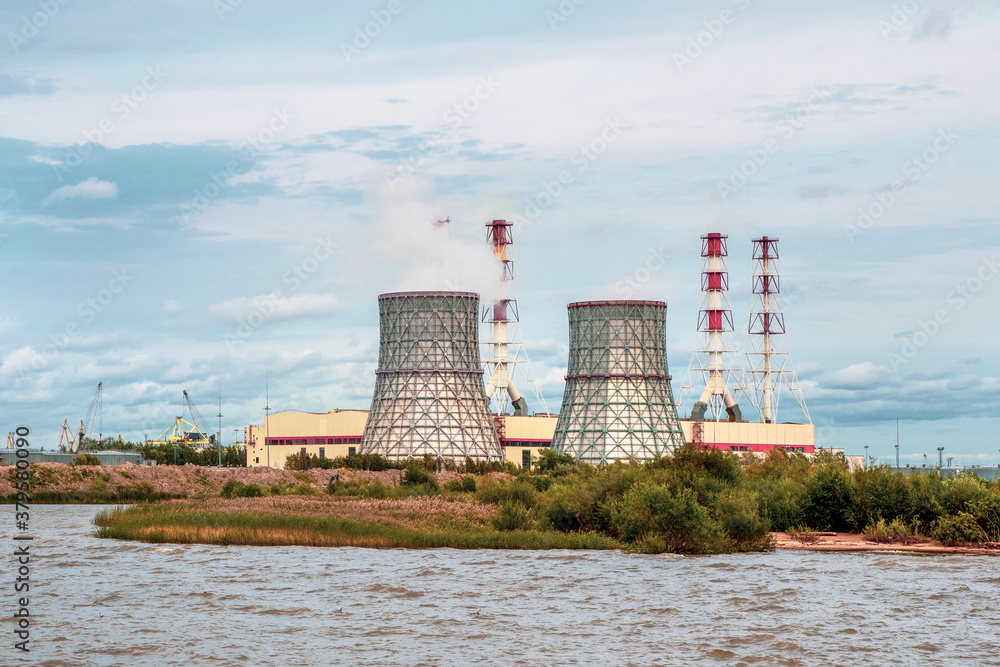 Chimneys of a power plant, an industrial district in the South-West of Saint Petersburg