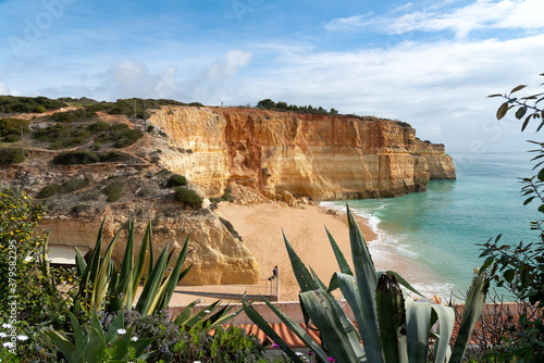 Benagil beach surrounded by rocky walls