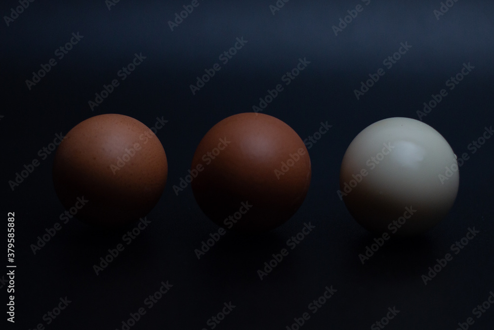 traditional healthy italian food. Tasty and fresh brown chicken eggs, raw and cooked, with their yellow yolk and egg white. Protein breakfast. Natural healthy food and organic farming concept. traditional healthy italian food. Tasty and fresh brown chicken eggs, raw and cooked, with their yellow yolk and egg white. Protein breakfast. Natural healthy food and organic farming concept.