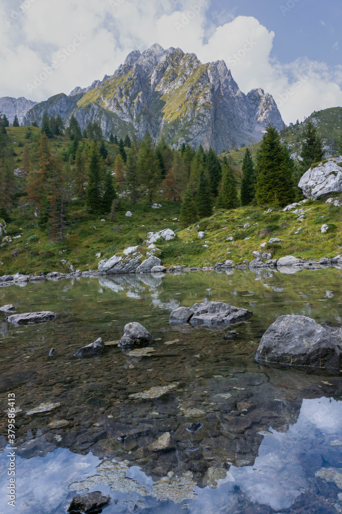 Portrait view of the upper Varicla lake early autumn - Orobie - Italian Alps