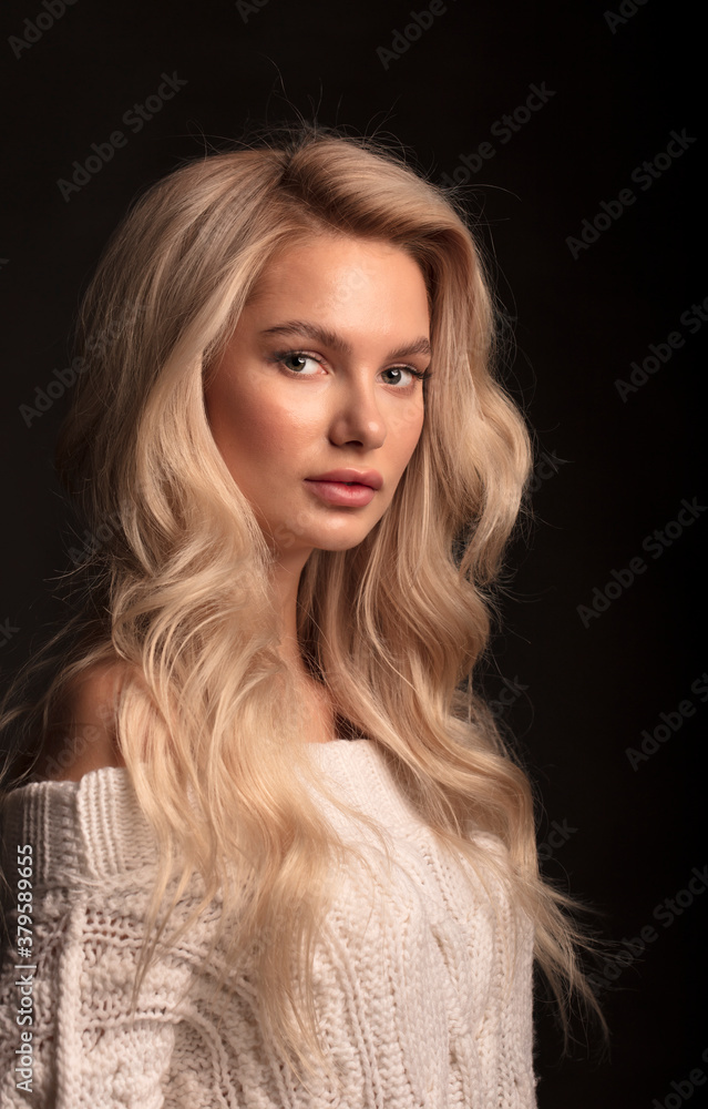 Fototapeta premium portrait of a young woman, shooting in a photo studio