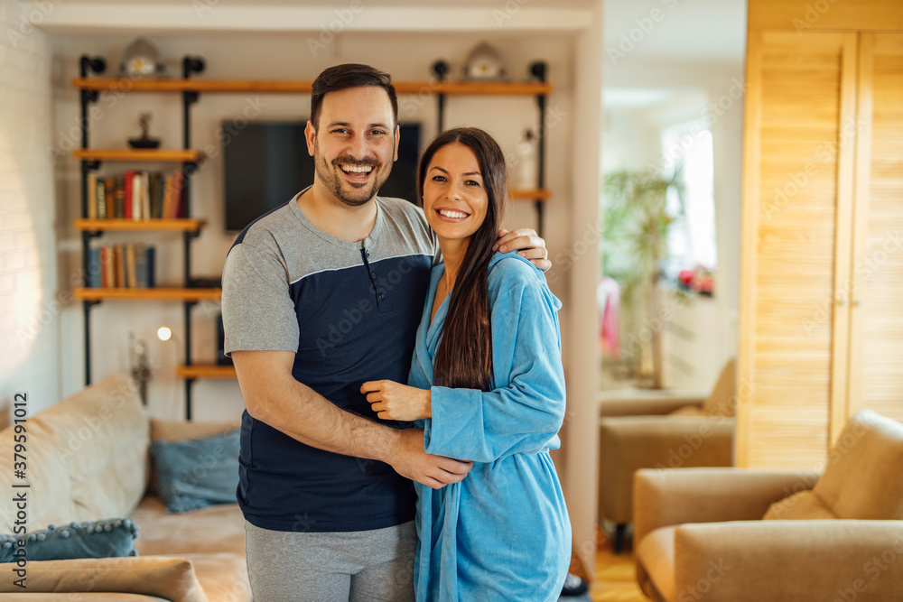 Home portrait of a happy couple in pajamas. Home portrait of a happy couple in pajamas.