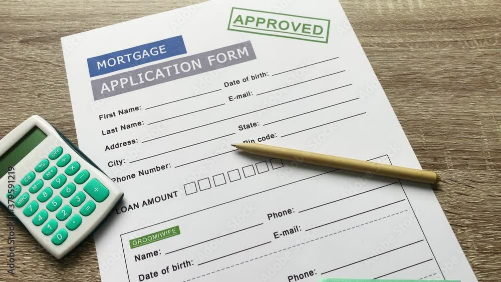Mortgage application form on a wooden table. Mortgage application form on a wooden table.