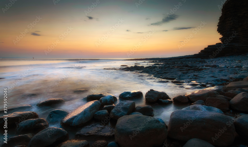 Sunset over the rocks at Nash Point on the Heritage coast in Glamorgan, South Wales, UK
