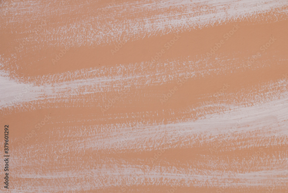 Fototapeta premium texture of beige background with strokes of white paint
