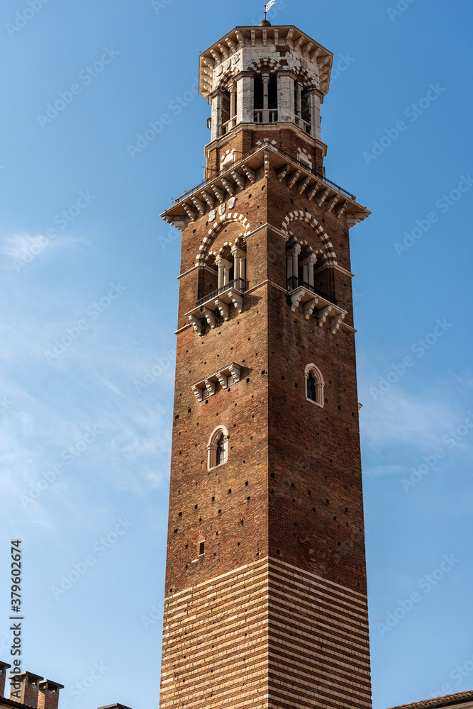 Verona. Torre dei Lamberti, medieval tower (XI century-1403) in Piazza delle Erbe, the oldest square in downtown. UNESCO heritage site, Veneto, Italy, Europe