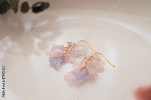 Fototapeta Naklejka Na Ścianę i Meble -  Handmade flower earrings made from Praban
