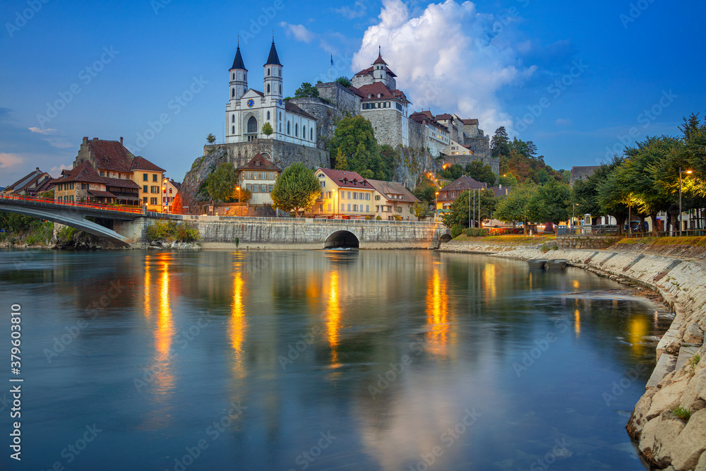 Aarburg, Switzerland. Cityscape image of beautiful city of Aarburg with the reflection of the city in the Aare river at sunset.