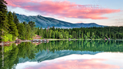 Lake McDonald with a vibrant colorful sunrise in Glacier National Park USA photo