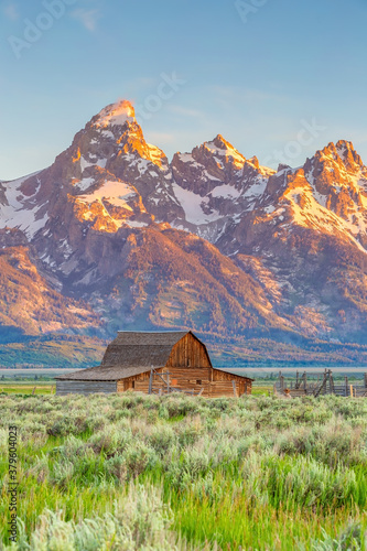 Valokuvatapetti The abandoned barn in the Mormon Row, Wyoming with Grand Tetons view