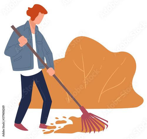 Autumn chores, character raking dry leaves cleaning yard